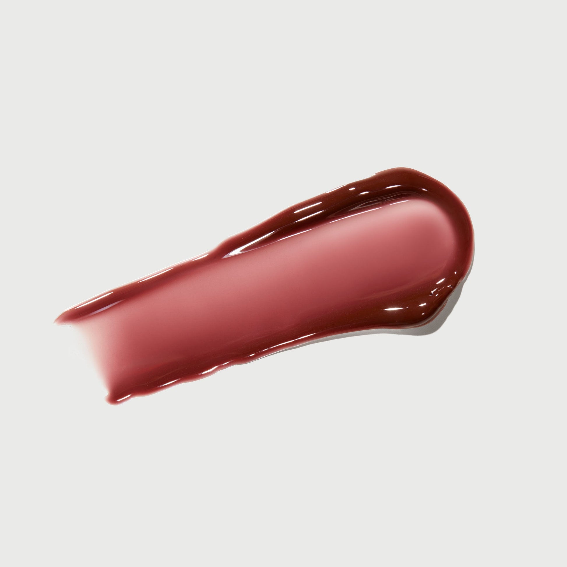 phyto-glow-lip-balm-crimson-p1 NATR-10122-Swatch-Phyto-Glow-Crimson-bonebkgd.jpg