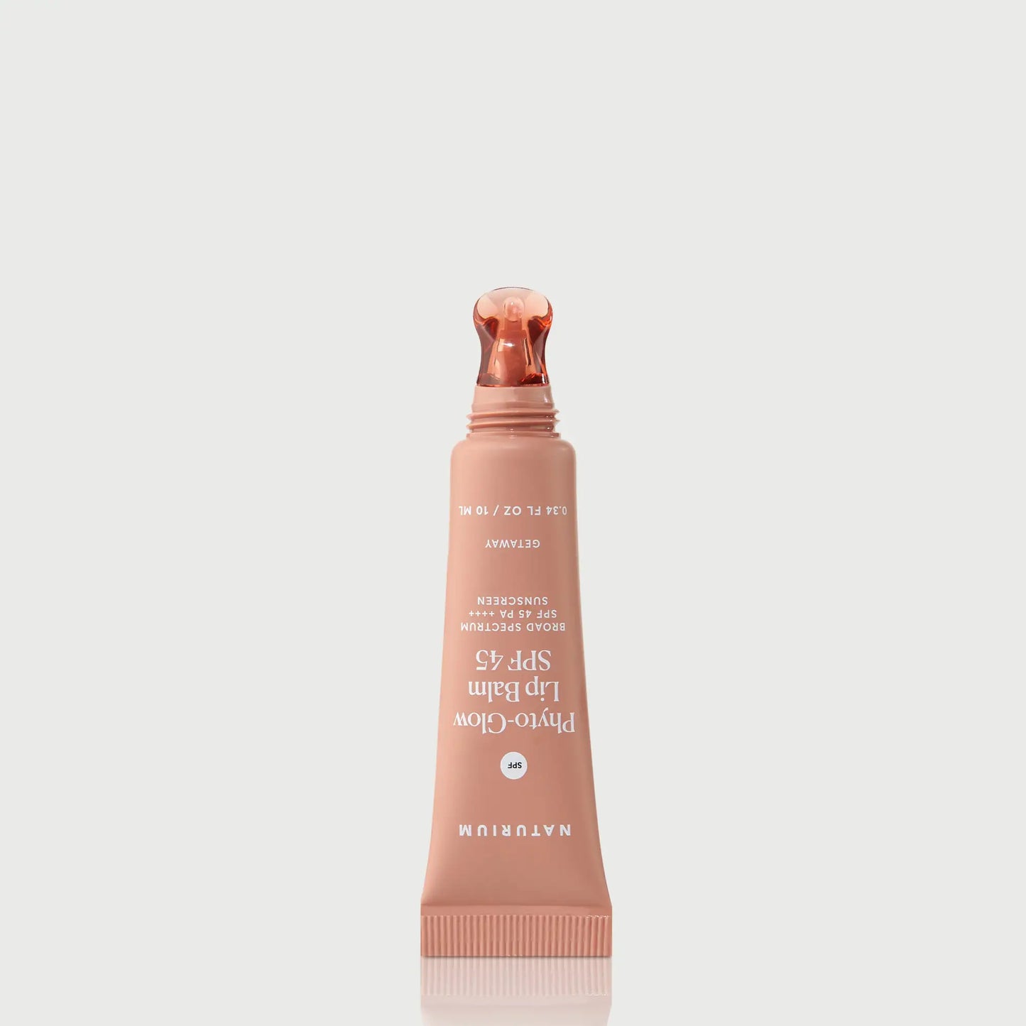 phyto-glow-lip-balm-spf-45-getaway-b7 NATR-10126_PhytoGlow_SPF_Getaway_primary_nocap_bonebkgd_1.webp