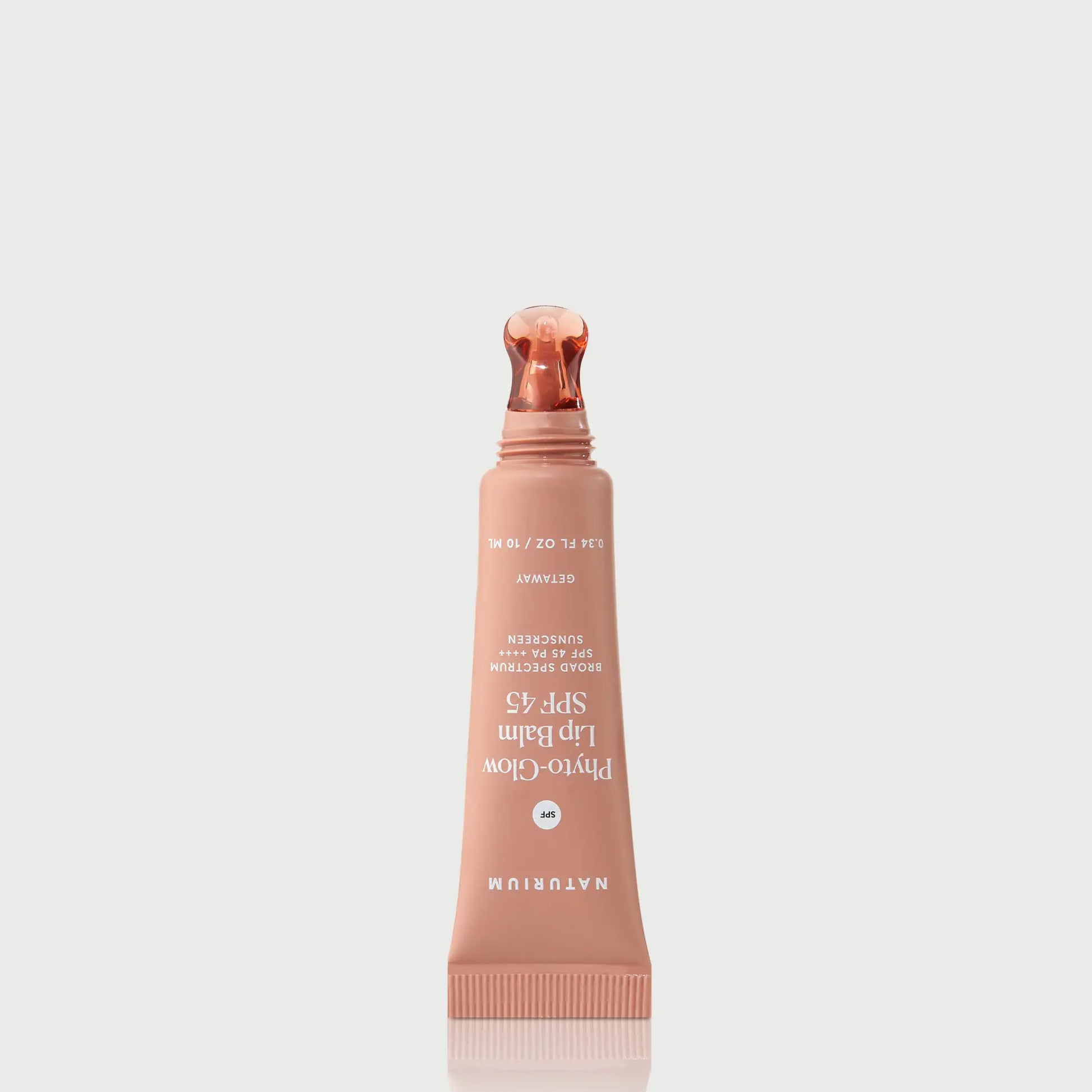 phyto-glow-lip-balm-spf-45-getaway-b7 NATR-10126_PhytoGlow_SPF_Getaway_primary_nocap_bonebkgd_1.webp
